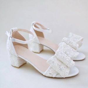 Ivory lace and bow wedding or cocktail shoes